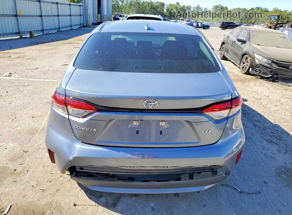 5YFEPMAE8NP305066 2022 TOYOTA COROLLA Gray Vista trasera