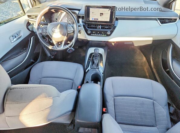 5YFS4MCE0PP145843 2023 TOYOTA COROLLA Серый Вид панели приборов
