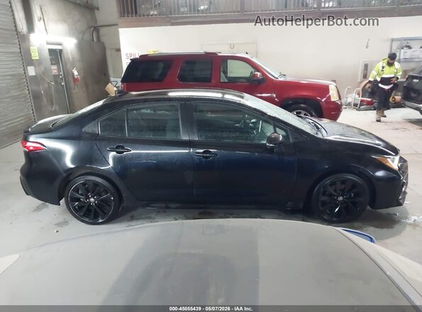 5YFS4MCE5MP058256 2021 TOYOTA COROLLA Black Вид задньої частини салону