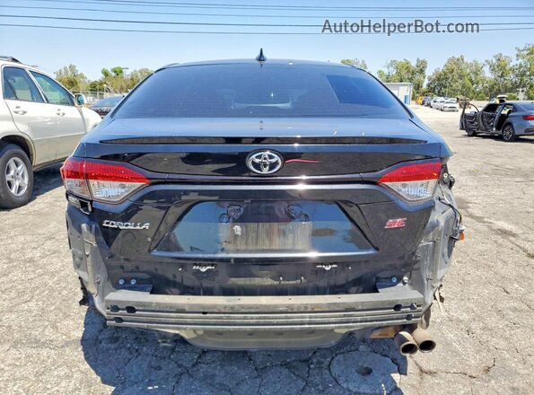 5YFS4MCE5MP096411 2021 TOYOTA COROLLA Black Rear view