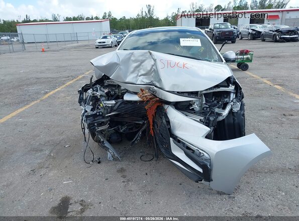 5YFS4MCE8PP151213 2023 TOYOTA COROLLA Silver Սալոնի հետևի տեսք