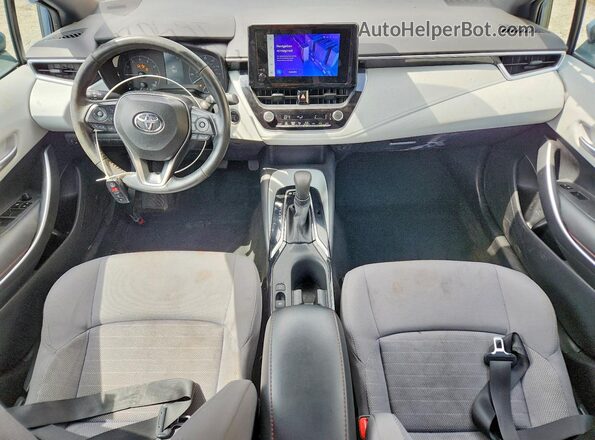 5YFS4MCE9PP164018 2023 TOYOTA COROLLA Синий Вид панели приборов