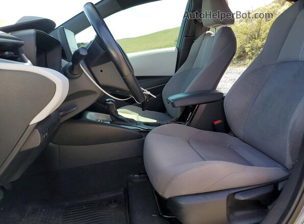 5YFS4MCEXPP146479 2023 TOYOTA COROLLA Gray Vista interior delantera