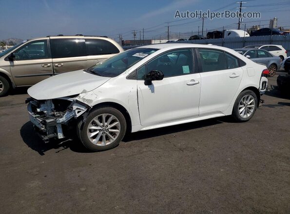 5YFVPMAE7MP178907 2021 TOYOTA COROLLA White Przód lewy