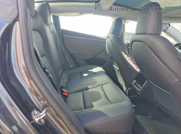 5YJ3E1EA6RF831796 2024 TESLA MODEL Gray Vista de los asientos traseros