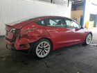 2023 Tesla Model 3 Красный vin: 5YJ3E1EA8PF435902 Damage: Deck Lid, Dent(S) W/ Paint Dmg, 2 To 3 Inches