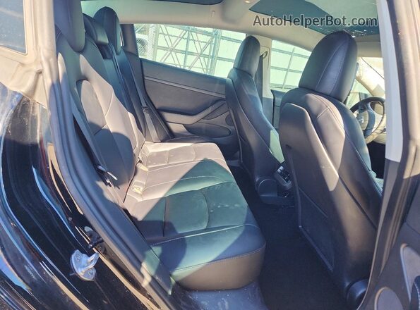 5YJ3E1EB6NF358551 2022 TESLA MODEL Black Widok tylnych siedzeń