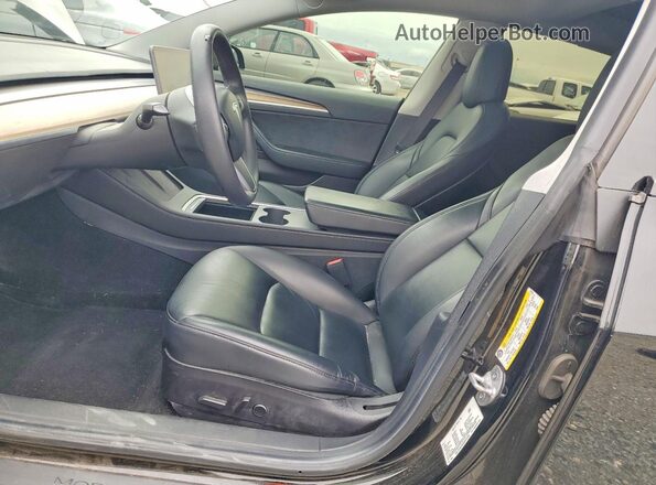 5YJ3E1EB9MF072286 2021 TESLA MODEL Black Vista interior delantera