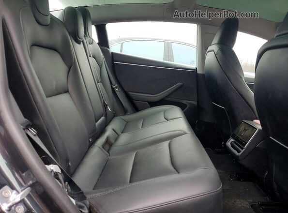 5YJ3E1EBXSF060306 2025 TESLA MODEL Gray Widok tylnych siedzeń