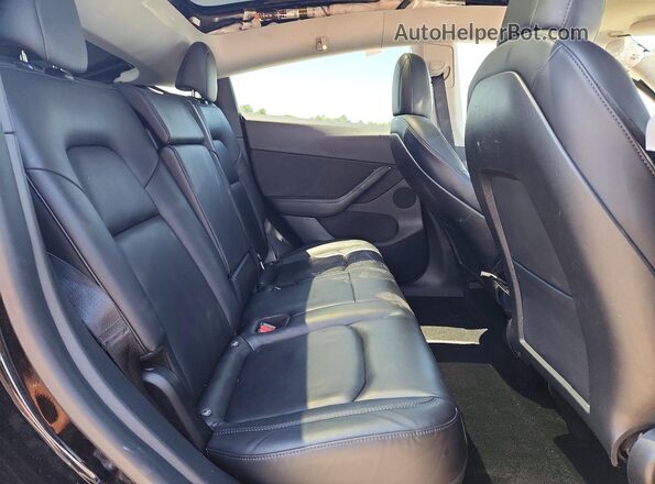 5YJYGDED8MF126339 2021 TESLA MODEL Black Vista de los asientos traseros