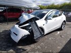 2021 Tesla Model Y Long Range Dual Motor All-wheel Drive White vin: 5YJYGDEE1MF208180