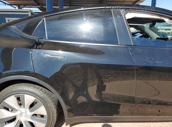 5YJYGDEE5MF297476 2021 TESLA MODEL Black Vista interior trasera