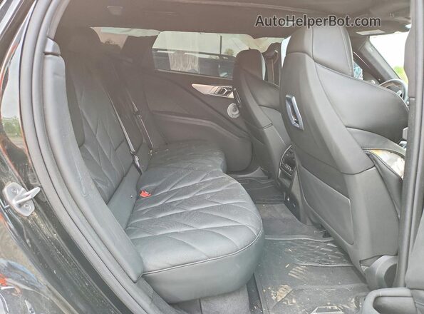 5YM23CS03S9Z60059 2025 BMW OTHER Черный Вид задней части салона