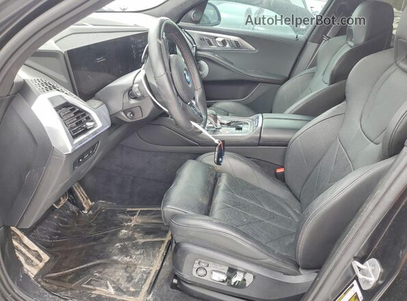 5YM23CS09R9X18080 2024 BMW OTHER Black Widok wnętrza z przodu