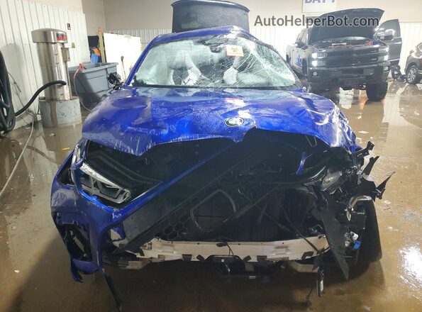 5YMCY0C06M9F10446 2021 BMW X6 Синий Вид спереди