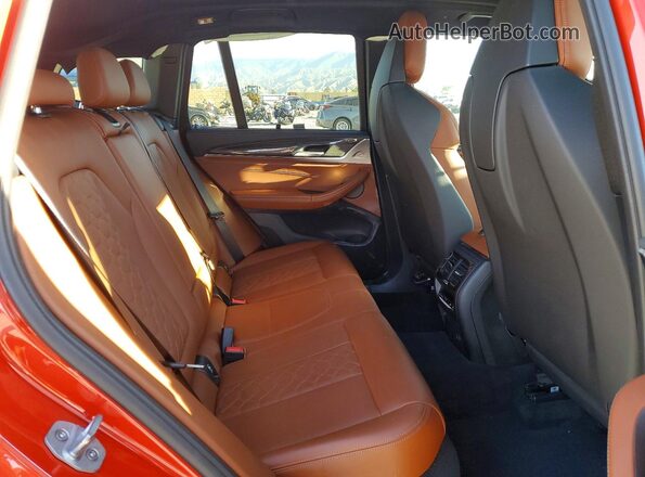 5YMTS0C09LLT11083 2020 BMW X3 Red Вид задньої частини салону