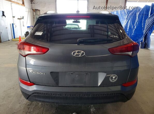 KM8J33A47GU207420 2016 HYUNDAI TUCSON Серый Вид салона спереди