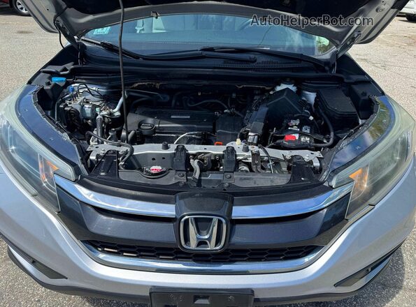 5J6RM4H35GL062627 2016 HONDA CRV Silver Widok wnętrza z przodu