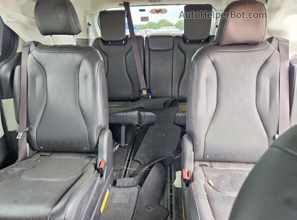 KNDNB4H34R6389418 2024 KIA CARNIVAL Красный Вид задней части салона