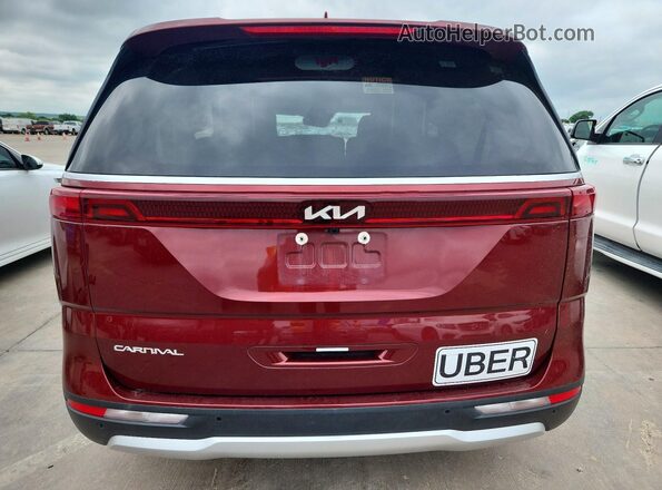 KNDNB4H34R6389418 2024 KIA CARNIVAL Красный Вид салона спереди