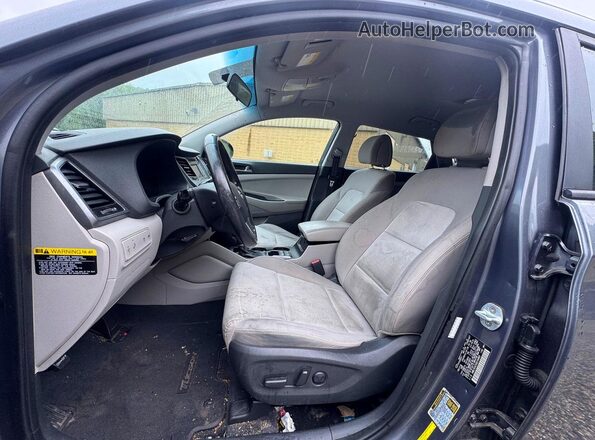 KM8J3CA2XGU194869 2016 HYUNDAI TUCSON Gray Vista frontal