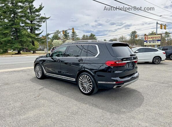 5UXCW2C06M9F67044 2021 BMW X7 Черный Передняя правая четверть