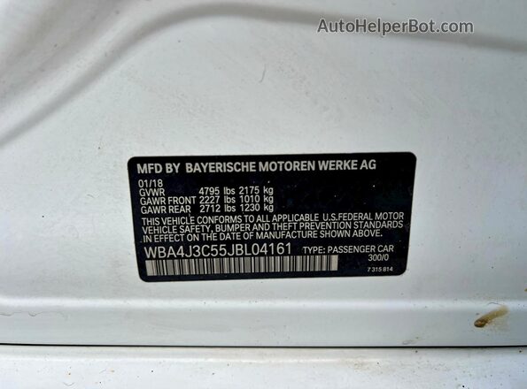 WBA4J3C55JBL04161 2018 BMW OTHER White Vista de los asientos traseros