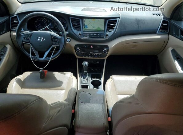KM8J33A25GU048637 2016 HYUNDAI TUCSON Коричневый Вид щитка приборов