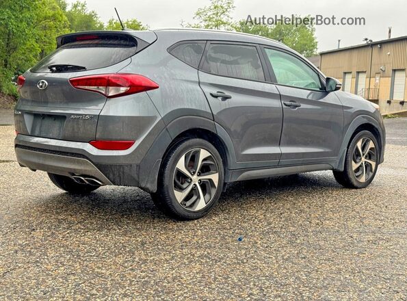 KM8J3CA2XGU194869 2016 HYUNDAI TUCSON Gray Delantero derecho