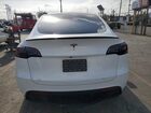 2024 Tesla Model Y White vin: 7SAYGDED1RF193049