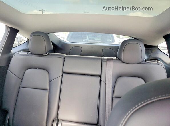 7SAYGDED1RF193049 2024 TESLA MODEL White Rear interior view