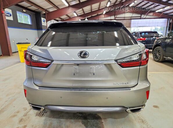 2T2ZZMCA0KC139011 2019 LEXUS RX Серый Вид салона спереди