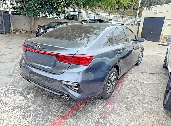 3KPF24AD7ME316523 2021 KIA FORTE Серый Вид спереди