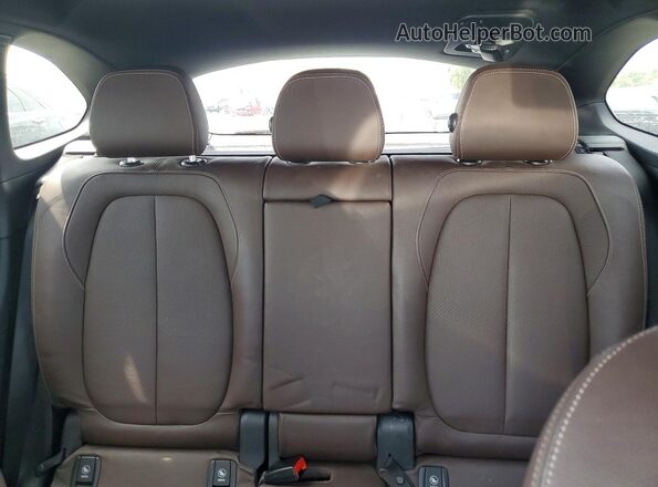 WBXHT3Z37H4A56438 2017 BMW X1 Черный Вид задней части салона