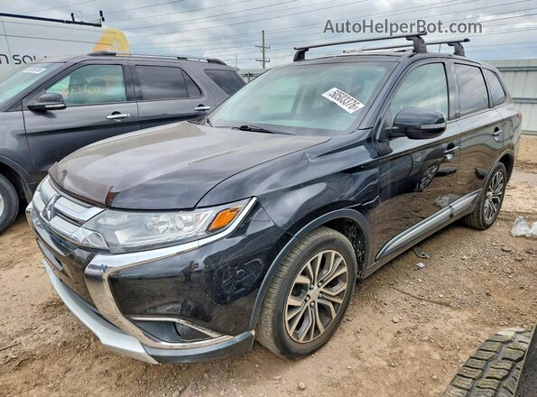 JA4AD3A36HZ010956 2017 MITSUBISHI OUTLANDER Черный Передняя левая четверть