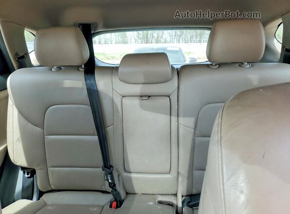 KM8J33A25GU048637 2016 HYUNDAI TUCSON Коричневый Вид задней части салона