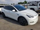 2024 Tesla Model Y White vin: 7SAYGDED1RF193049