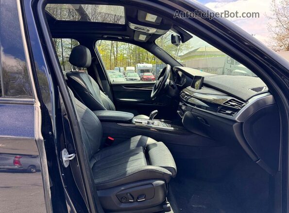 5UXKR0C56J0X92077 2018 BMW X5 Черный Вид панели приборов