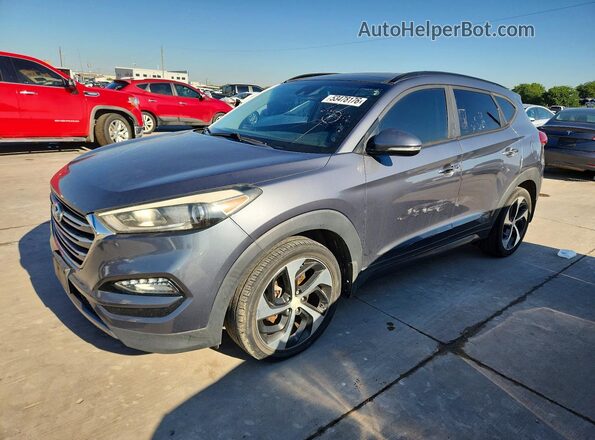 KM8J33A23GU239506 2016 HYUNDAI TUCSON Gray Trasero izquierdo