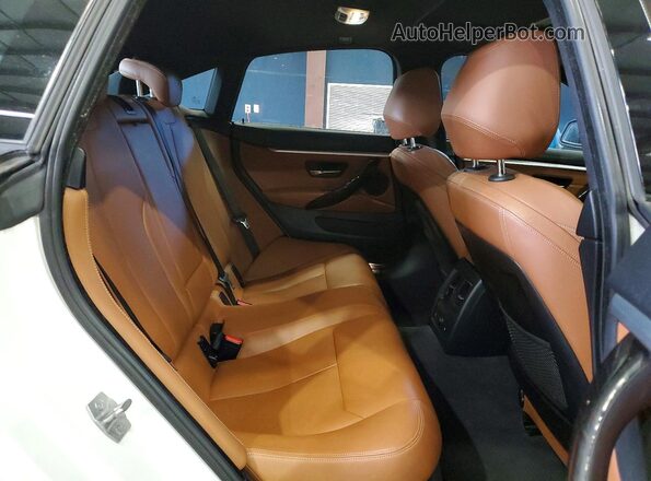WBA4C9C51GG136141 2016 BMW OTHER Белый Вид задней части салона