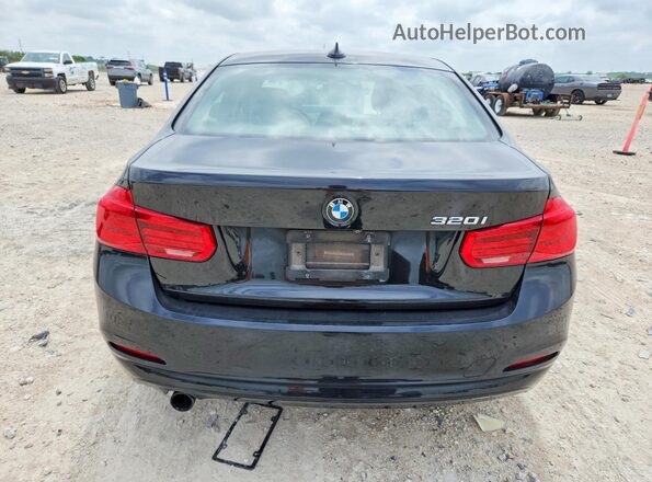 WBA8E1G59JNU90189 2018 BMW OTHER Черный Вид салона спереди