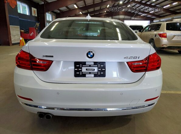 WBA4C9C51GG136141 2016 BMW OTHER Белый Вид салона спереди