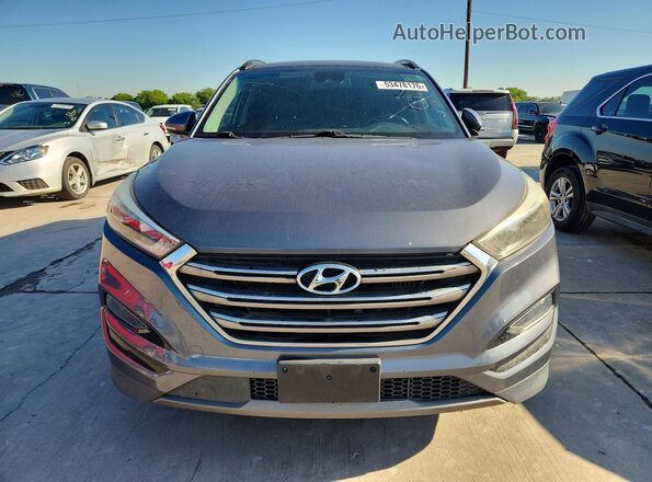 KM8J33A23GU239506 2016 HYUNDAI TUCSON Gray Vista trasera