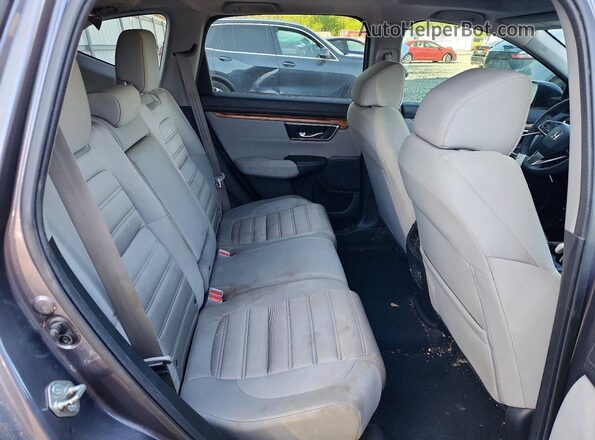 7FARW1H5XJE012644 2018 HONDA CRV Серый Вид задней части салона