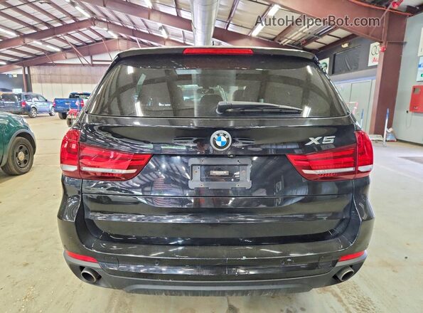 5UXKR0C51G0P27730 2016 BMW X5 Черный Вид салона спереди