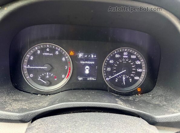 KM8J3CA2XGU194869 2016 HYUNDAI TUCSON Gray Vista del salpicadero