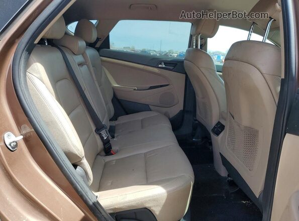 KM8J33A25GU048637 2016 HYUNDAI TUCSON Коричневый Вид подкапотного пространства