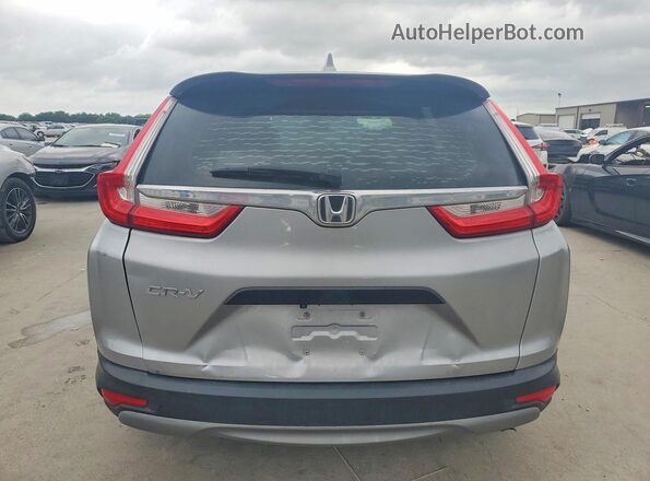 2HKRW5H31JH425605 2018 HONDA CRV Серебряный Вид салона спереди