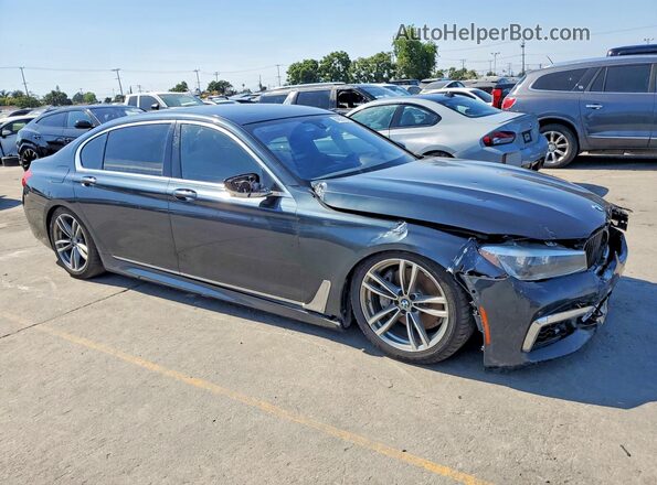 WBA7E4C51KGV28667 2019 BMW 7 SERIES Gray Widok z przodu