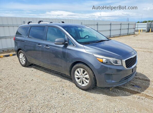 KNDMB5C12H6245078 2017 KIA SEDONA Gray Delantero derecho